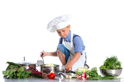 Boy kitchener in chef's hat Foto stock