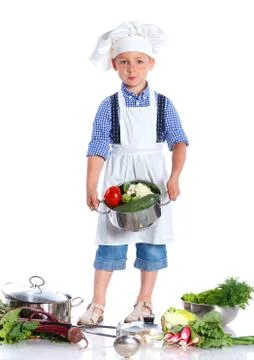 Boy kitchener in chef's hat Fotos Stock