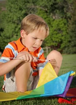 Boy with kite Stock Photos