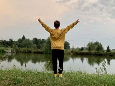 Boy by the lake Stock Photos