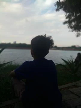 A Boy Lake Stock Photos