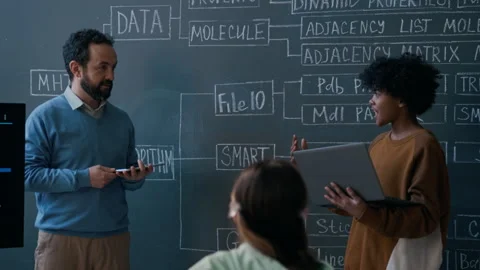 Boy with Laptop Answering Questions on Classification Tree at Coding Lesson Stock Footage 306979260