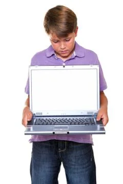 Boy with laptop blank screen Stock Photos