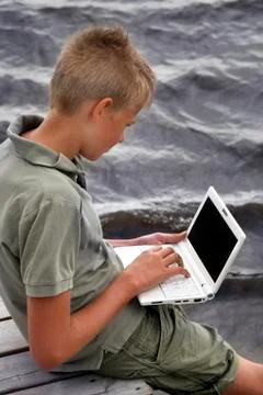 Boy with a laptop Foto stock