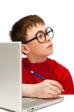 Boy with a laptop Stock Photos
