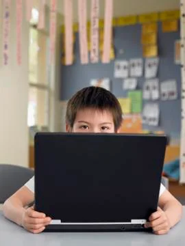 Boy With Laptop Stock Photos
