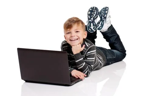 Boy with laptop Stock Photos