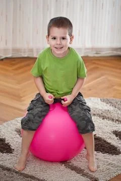 Boy with large ball Stock Photos