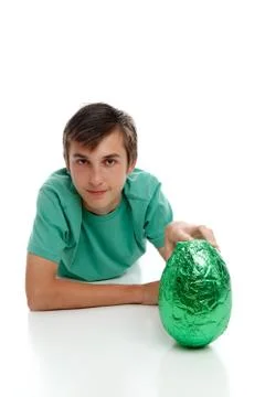 Boy with a large easter egg Stock Photos