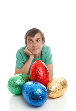 Boy with large easter eggs Stock Photos