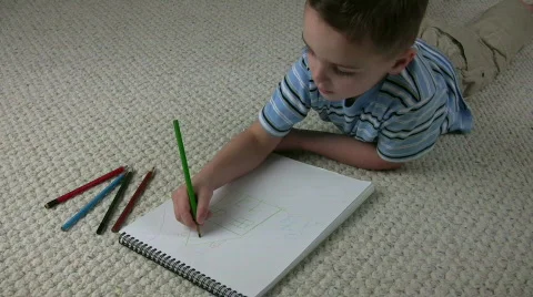 Boy Laying Coloring Stock Footage 595936