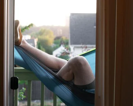 Boy laying in hammock Stock Photos