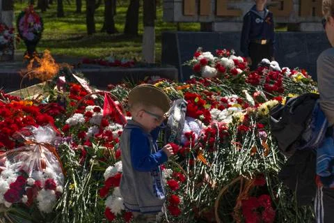 Boy on the laying at the Memorial Stock Photos