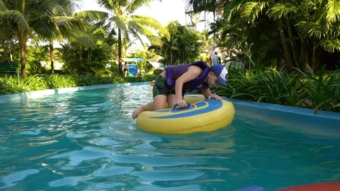 Boy in  Lazy river in Phu Quoc Stock Footage 106612095