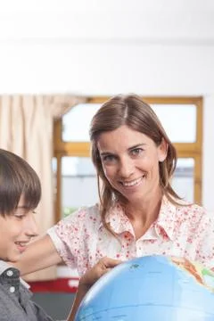 Boy learning geography Foto stock