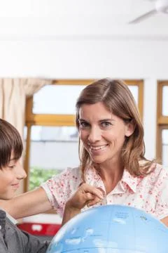 Boy learning geography Stock Photos