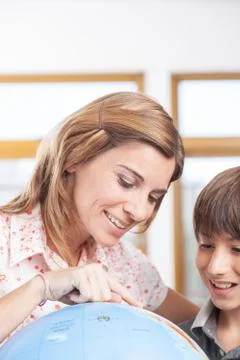 Boy learning geography Foto stock