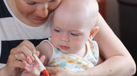 Boy learning handwriting practice from mother Stock Footage 63432938