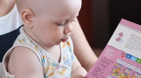 Boy learning handwriting practice from mother Stock Footage 63433306