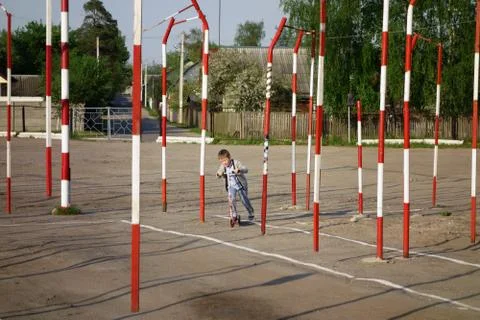 Boy learning to ride Stock Photos