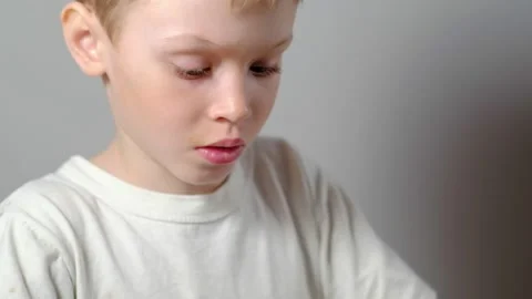 Boy learning to stick on a potter's wheel close-up Stock Footage 151642670