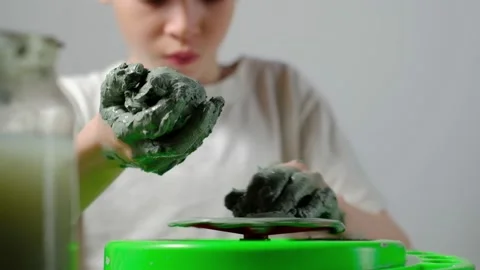 Boy learning to stick on a potter's wheel close-up Video stock 151644006
