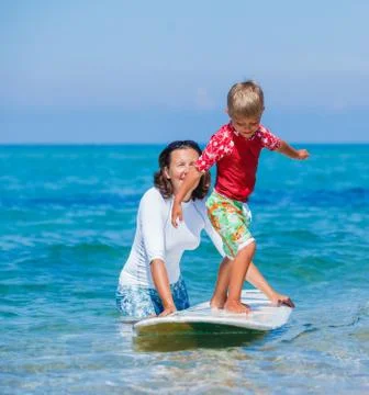 Boy learning surfing 写真素材