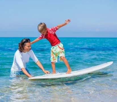 Boy learning surfing 写真素材