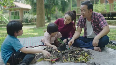 Boy learns how to make natural compost. 스톡 동영상 179375724