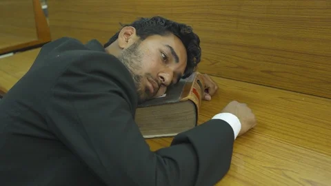 Boy at library,tensed,tired Video stock 124490750