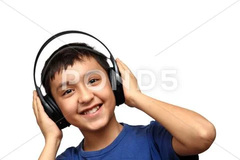 Boy listening music in headphones Stock Photos