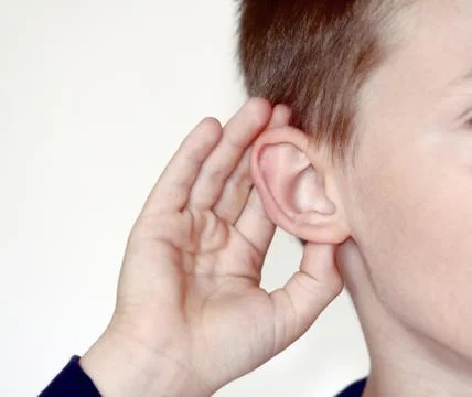 Boy listens Stock Photos