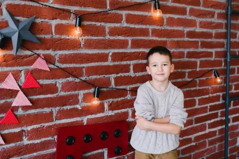 Boy in a loft studio Stock Photos