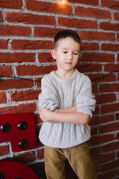 Boy in a loft studio Stock Photos