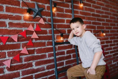 Boy in a loft studio Stock Photos