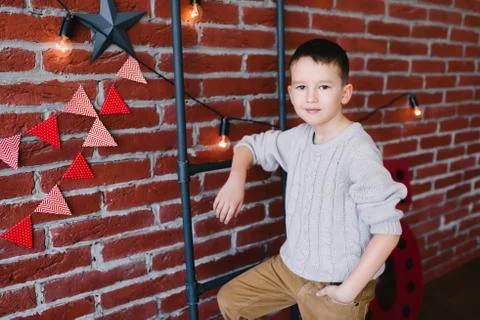 Boy in a loft studio Stock Photos