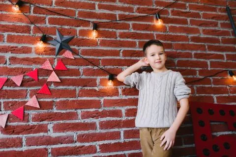 Boy in a loft studio Stock Photos