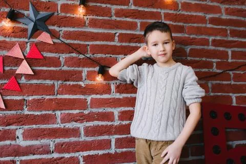 Boy in a loft studio Stock Photos
