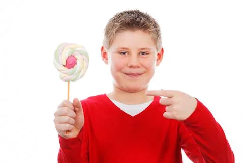 Boy with lollipop Stock Photos