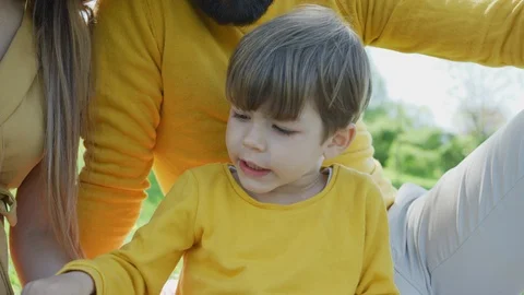 Boy looking into a book Stock Footage 100003117