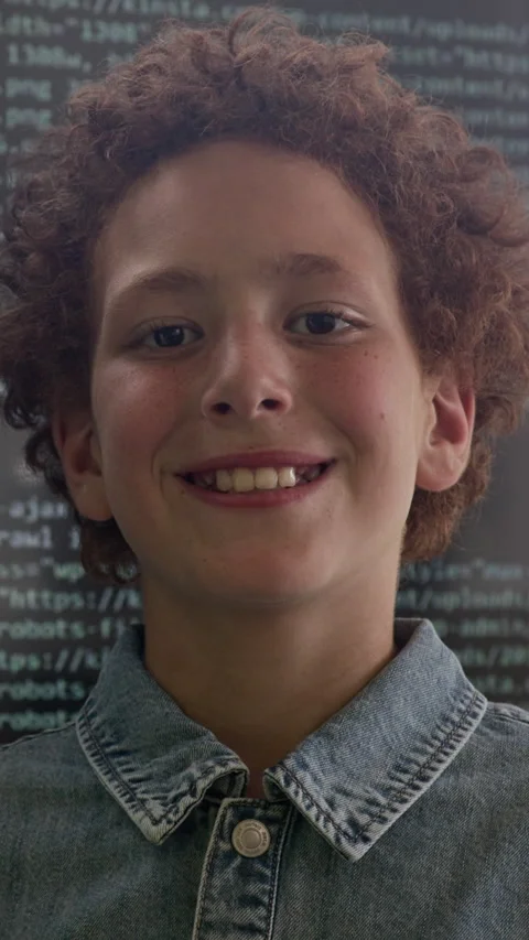 Boy Looking at Camera by Interactive Board with Programming Language Stock Footage 316484666