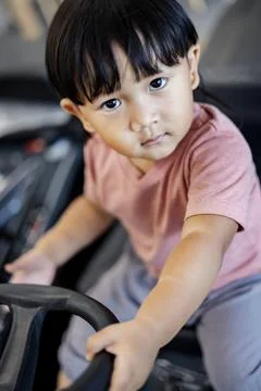 Boy Is Looking Into The Camera Stock Photos