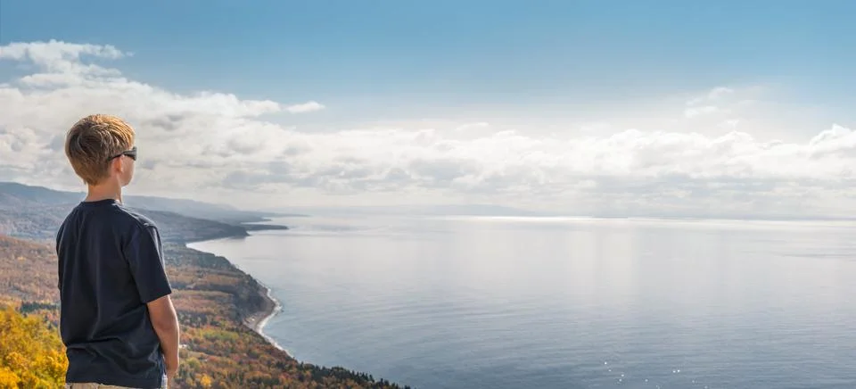 Boy  looking down from the top Stock Photos