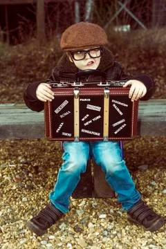 Boy looking like a nerd, with funny expression Stock Photos
