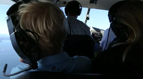 Boy Looking out Airplane WIndow. Video stock 42208546