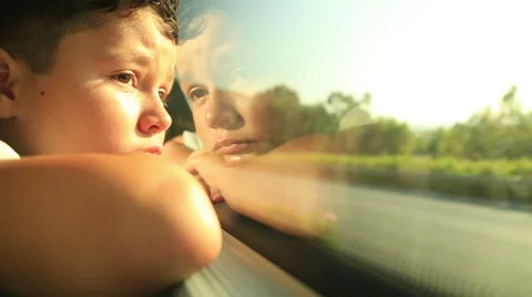 Boy Looking Out Window 3 Stock Footage 64724264
