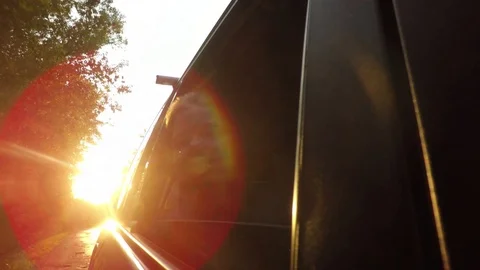 Boy looking out window while driving in car Video stock 94735451