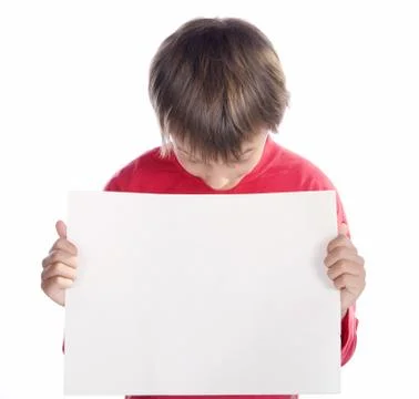 Boy looking at placard Stock Photos