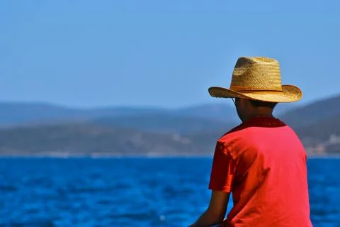 Boy looking at the sea Stock Photos