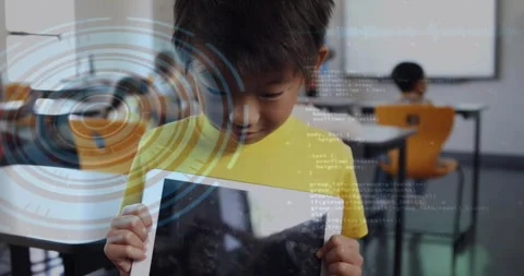 Boy looking at tablet, raising head, lifting tablet while HUD code overlays, Stock Footage 331227333